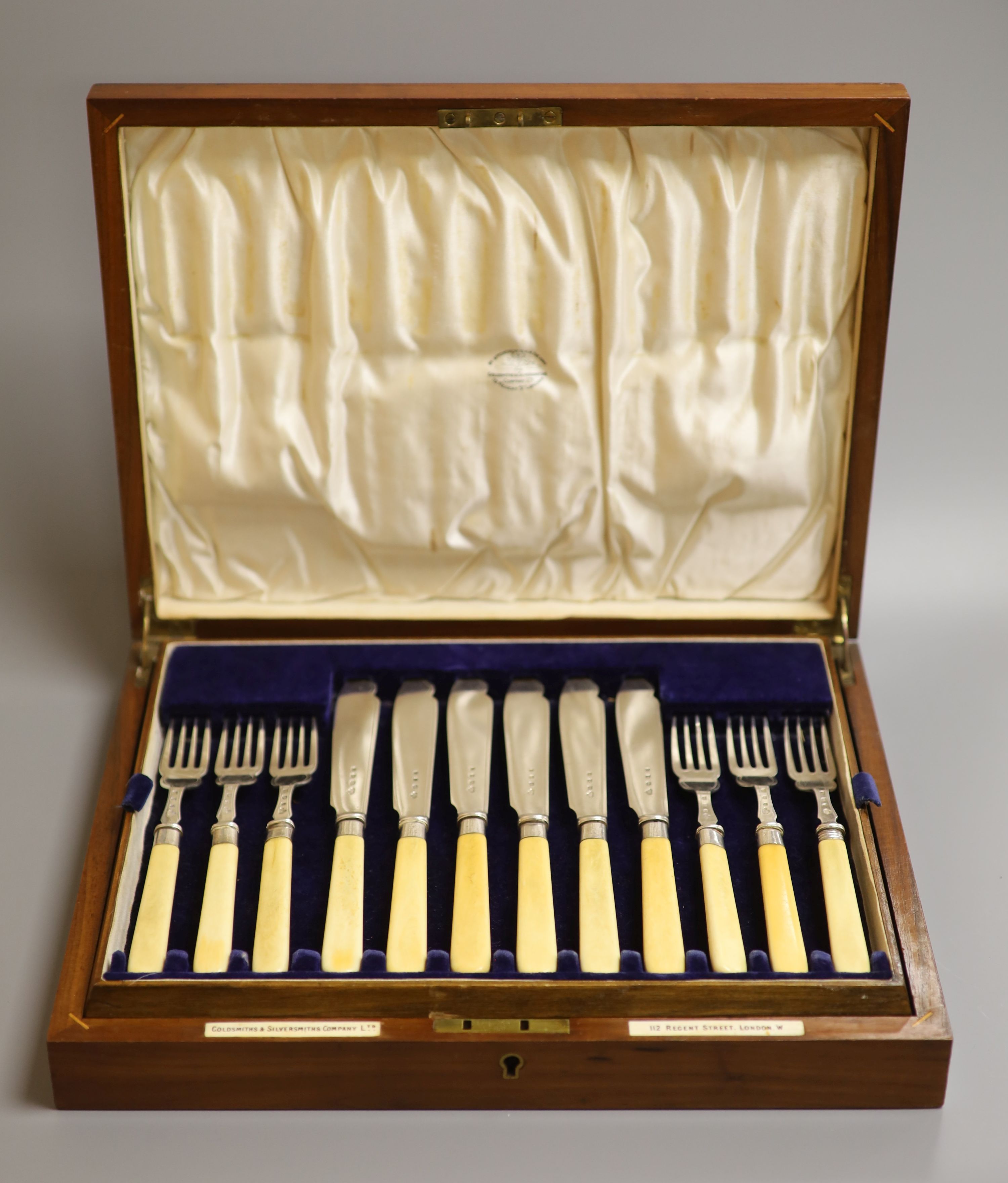 A cased set of twelve pairs of George V ivory handled silver fish eaters, Goldsmiths & Silversmiths Co Ltd, London, 1933.